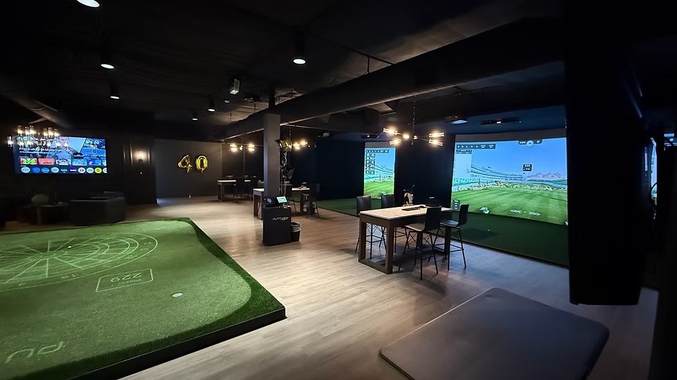 Inside Swing Shift Golf: the putting green, the simulator bays and the lounge